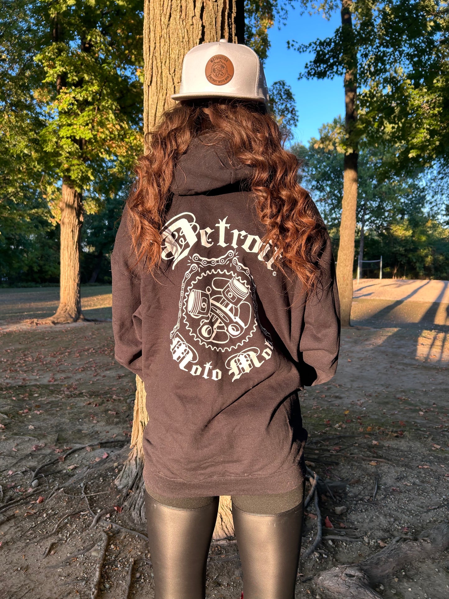 Snap Back Cap - All Black Trucker Hat with Natural Leather Moto Vation Patch